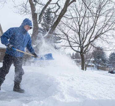 Clearing Snowy Paths with Snow Shovel