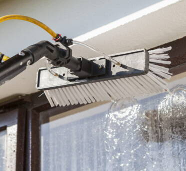 Man Doing Professional Window Cleaning